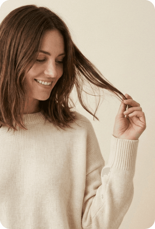 Man touching full hair